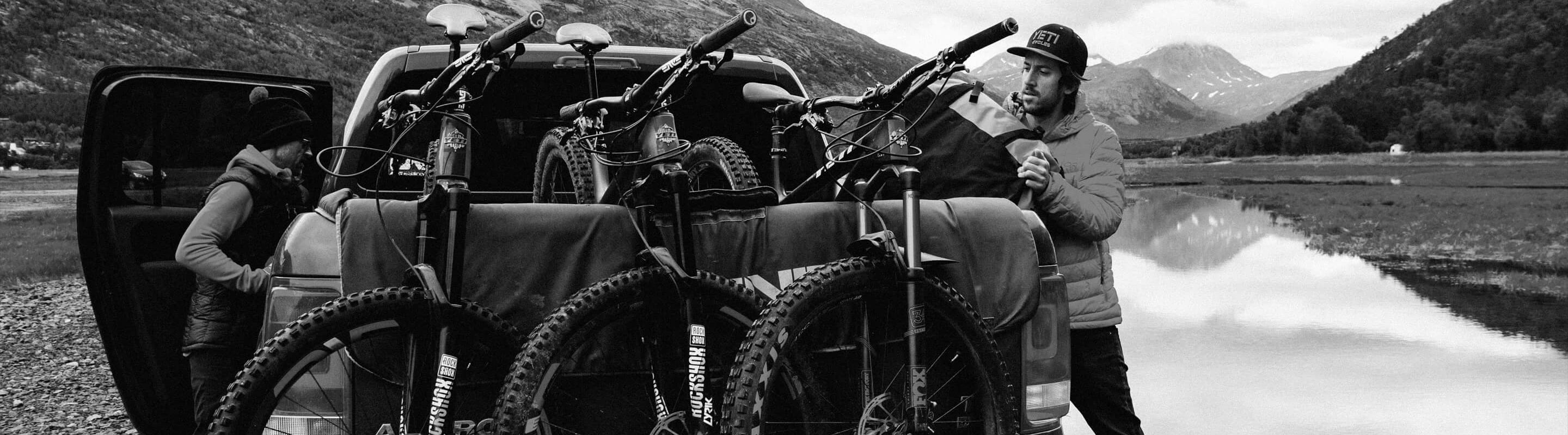 3 bikes on a truck tailgate pad