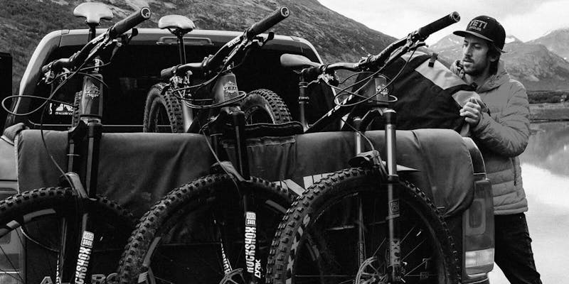 3 bikes on a truck tailgate pad