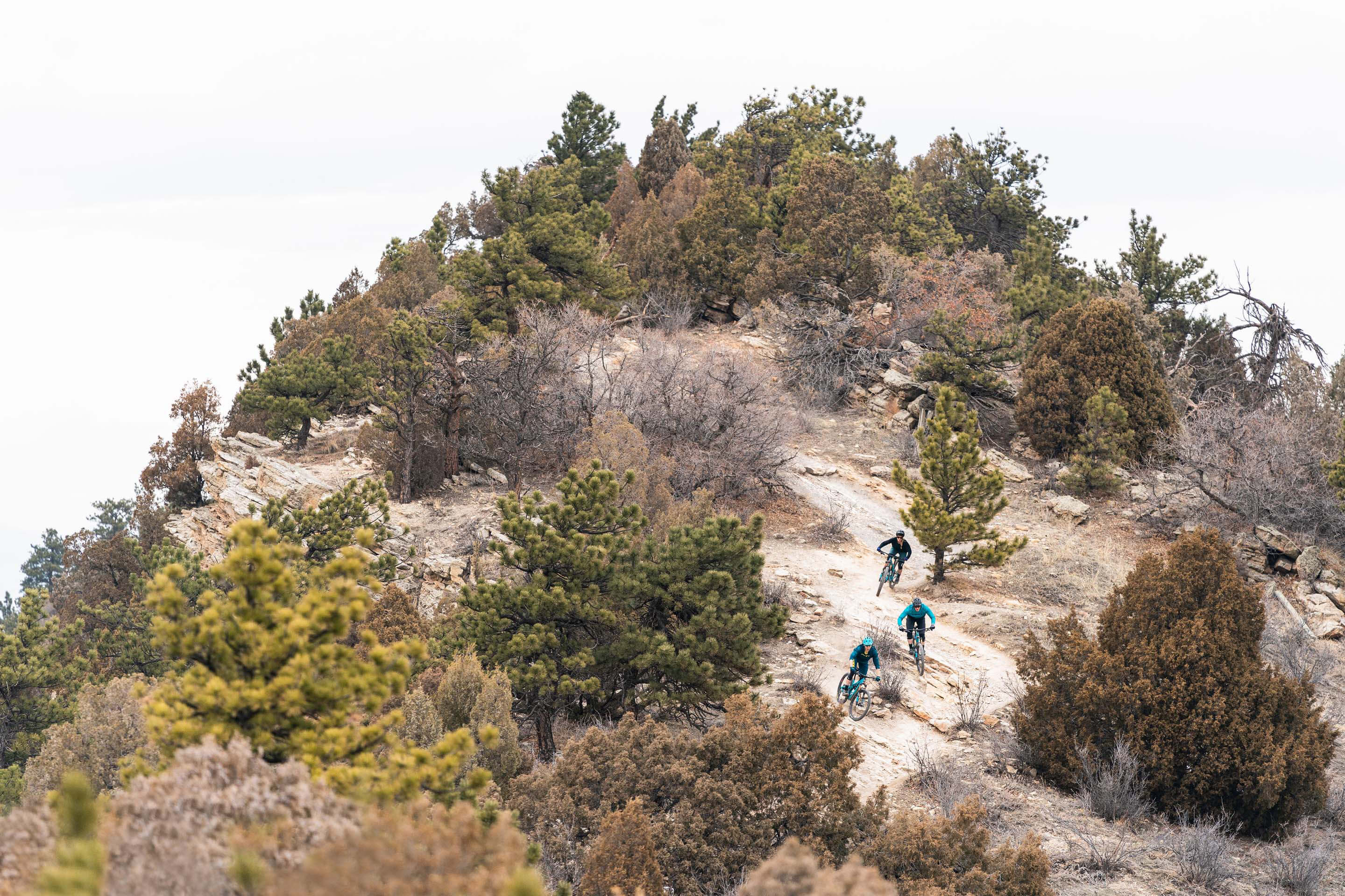 Yeti employees descending Dakota Ridge