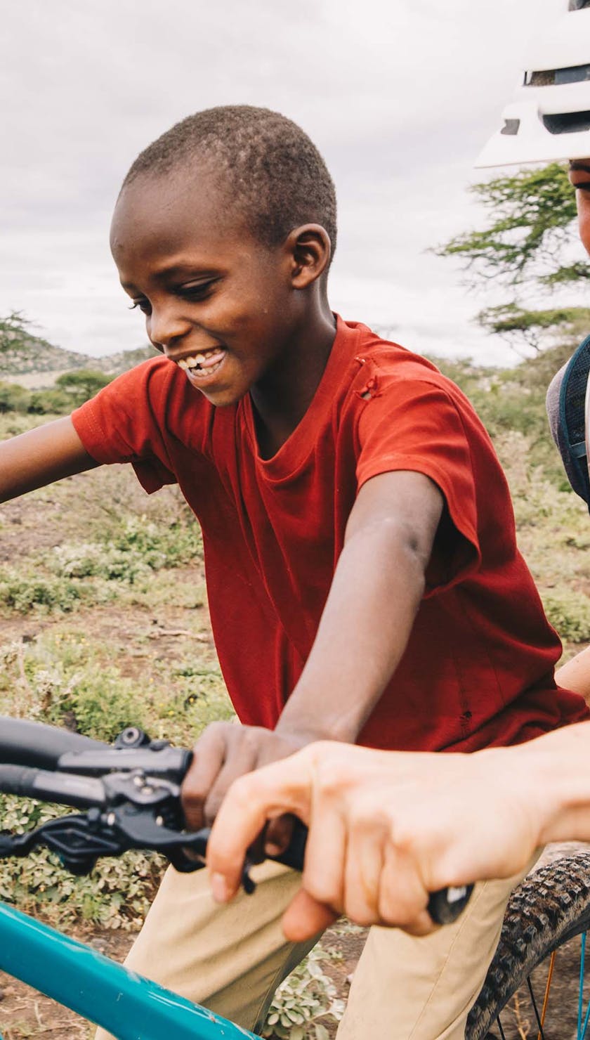 Nicole Baker in Uganda spreading bike stoke