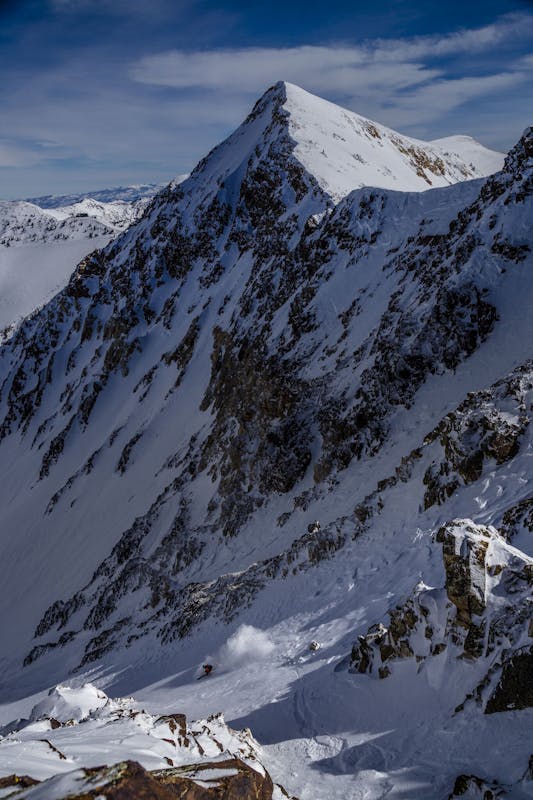 Carston Oliver skiing a chute