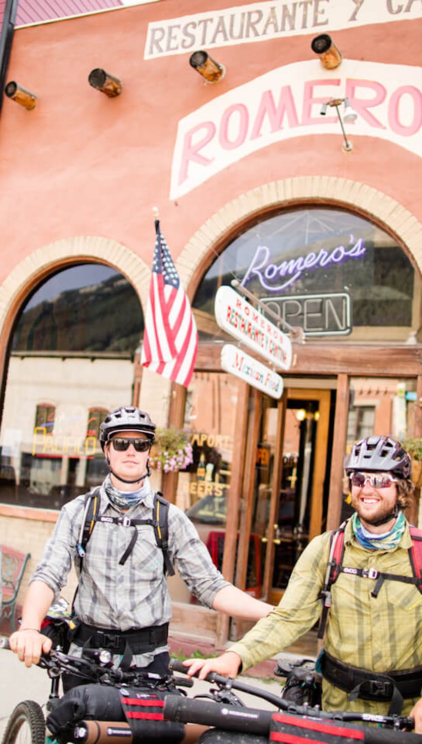 Justin Reiter, Dylan, Ben Kraushaar, Sam Seward stand together with their Yeti bikes packed for the trip