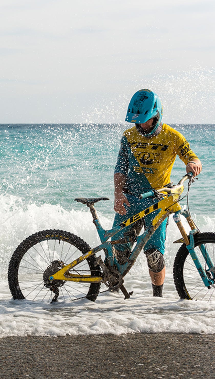 Jared Graves and Richie Rude celebrate on the beach of Finale