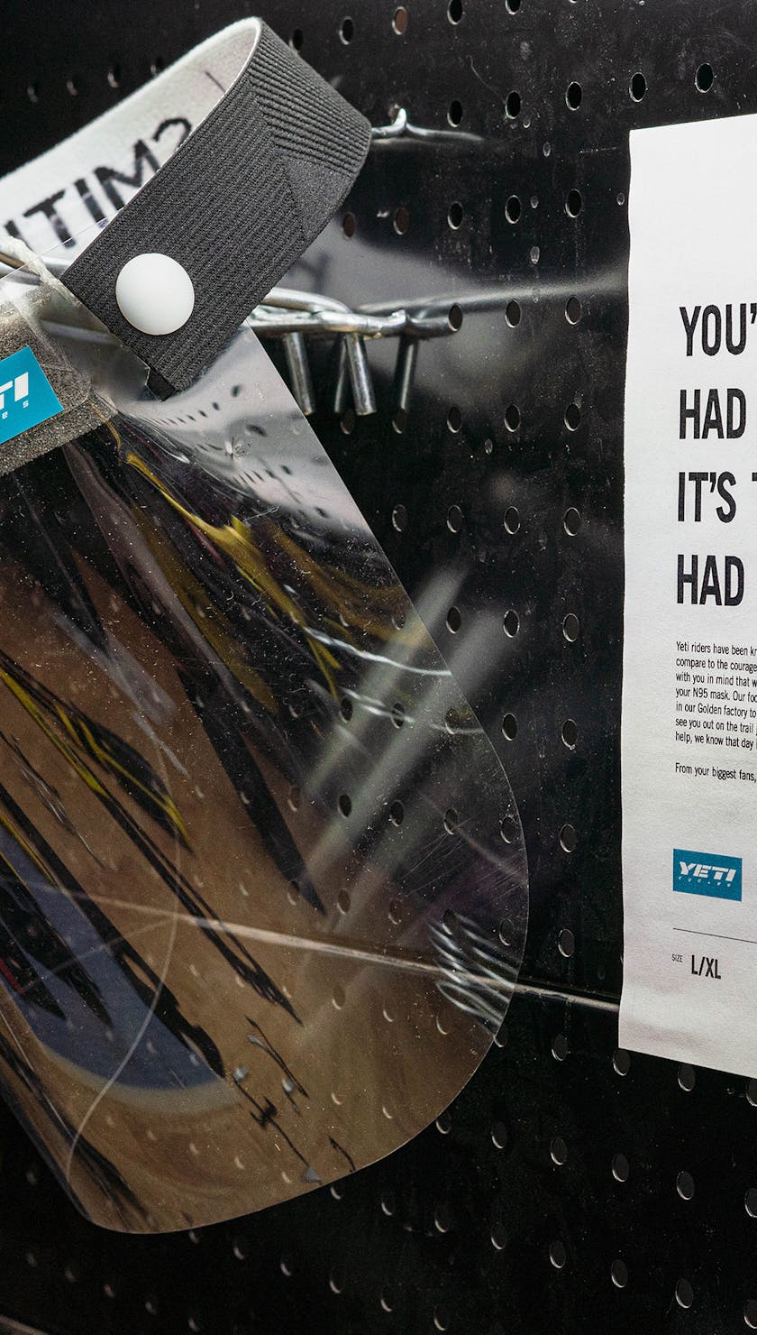 Shield on a peg board with a message from Yeti