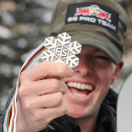 Justin Reiter holding his hard earned medal.