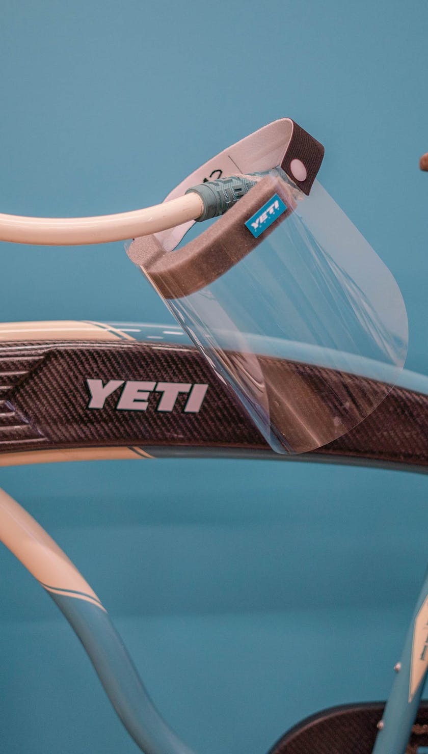 A shield hangs from an vintage Yeti Zephyr