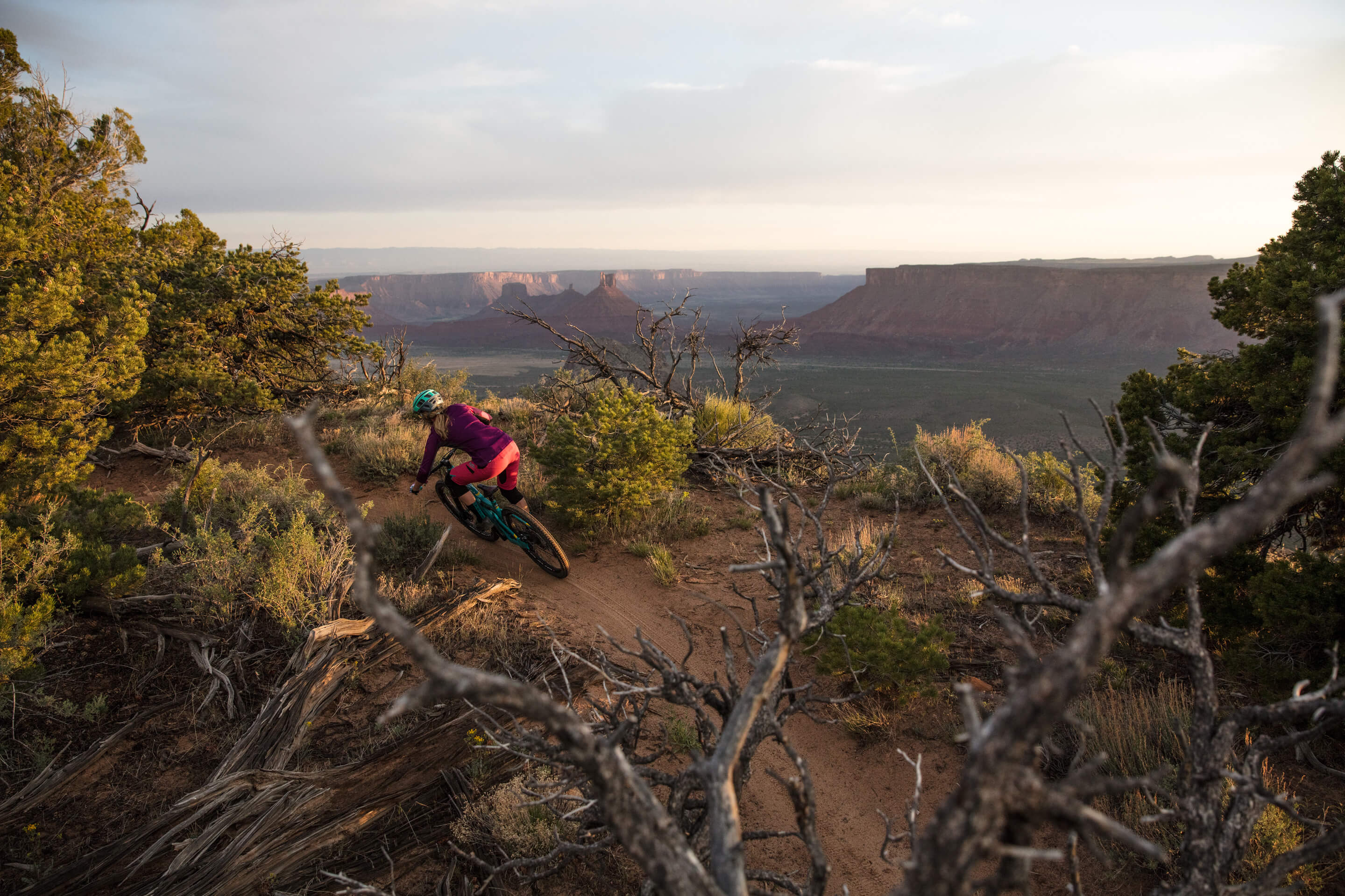 Sarah Rawley descending Porcupine Rim in Moab, UT