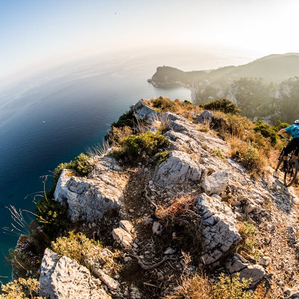 Francesco Gozio riding a ridge in Finale